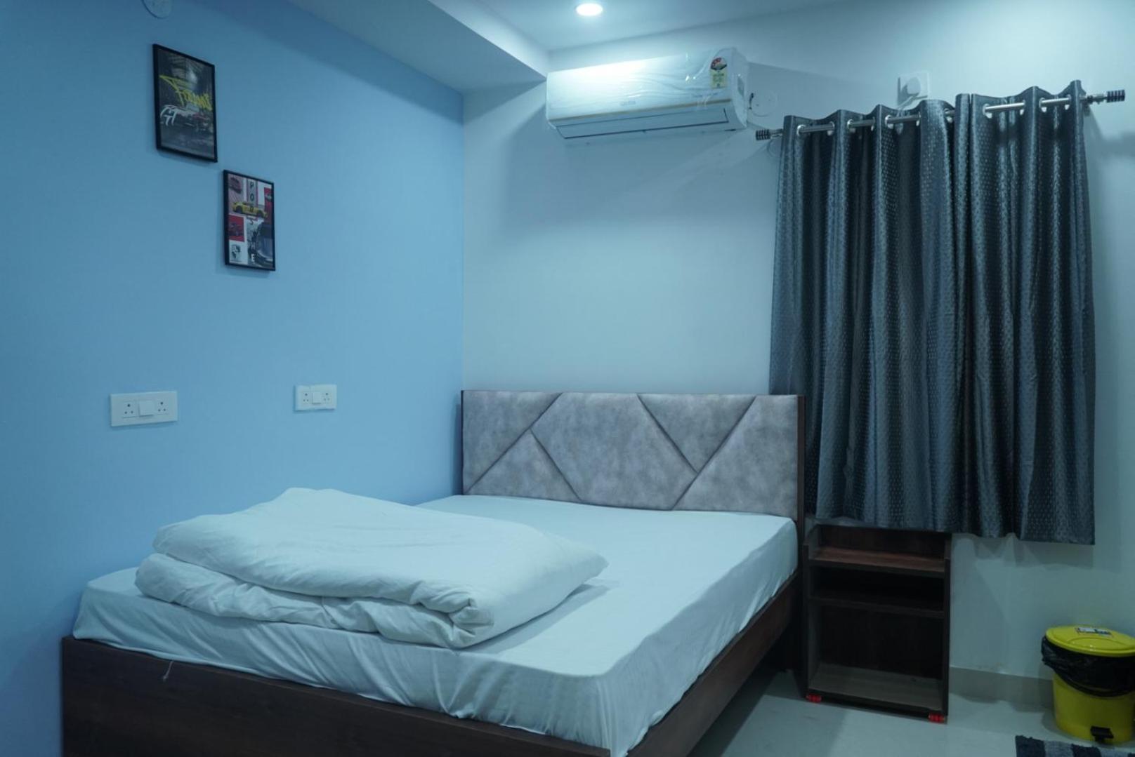 Cosmic Hotel & Guest House Gachibowli Raidurg Hyderabad Exterior foto